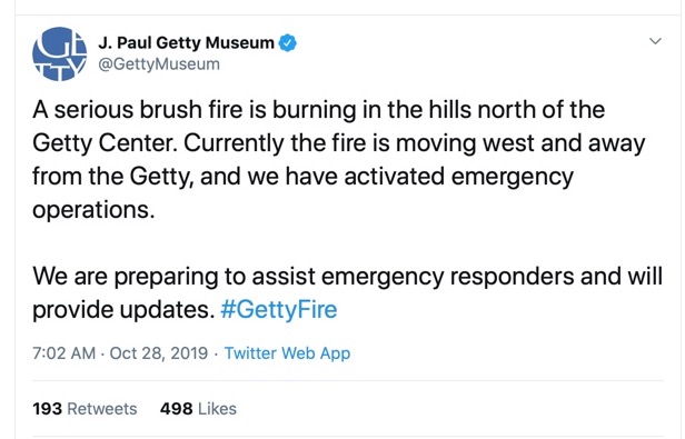A Twitter post with the following text: A serious brush fire is burning in the hills north of the Getty Center. Currently the fire is moving west and away from the Getty, and we have activated emergency operations. We are preparing to assist emergency responders and we will provide updates. #GettyFire
